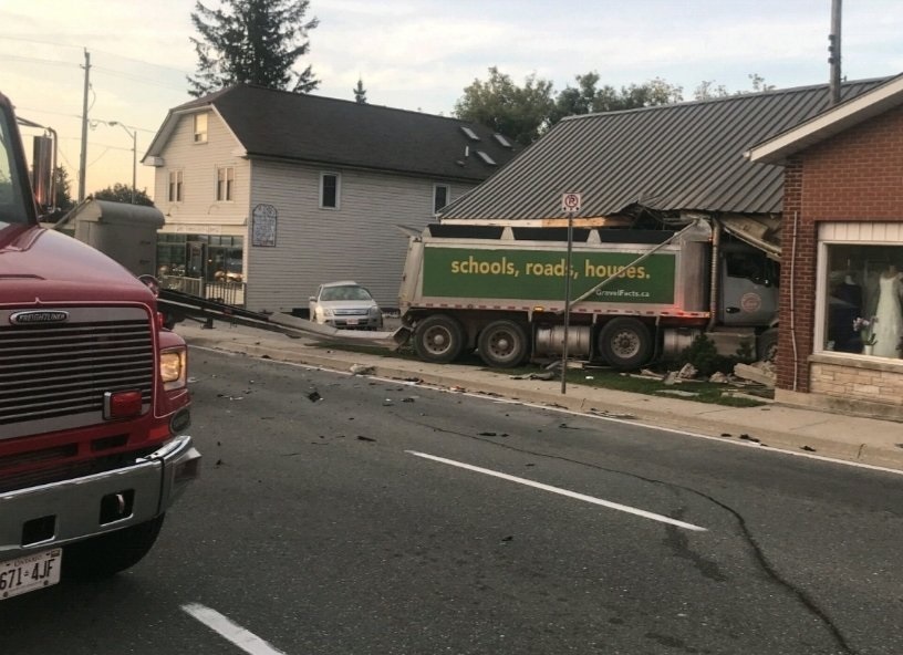 HWY 10 CLOSED AT CALEDON VILLAGE AFTER DUMP TRUCK CRASHES INTO BUILDING